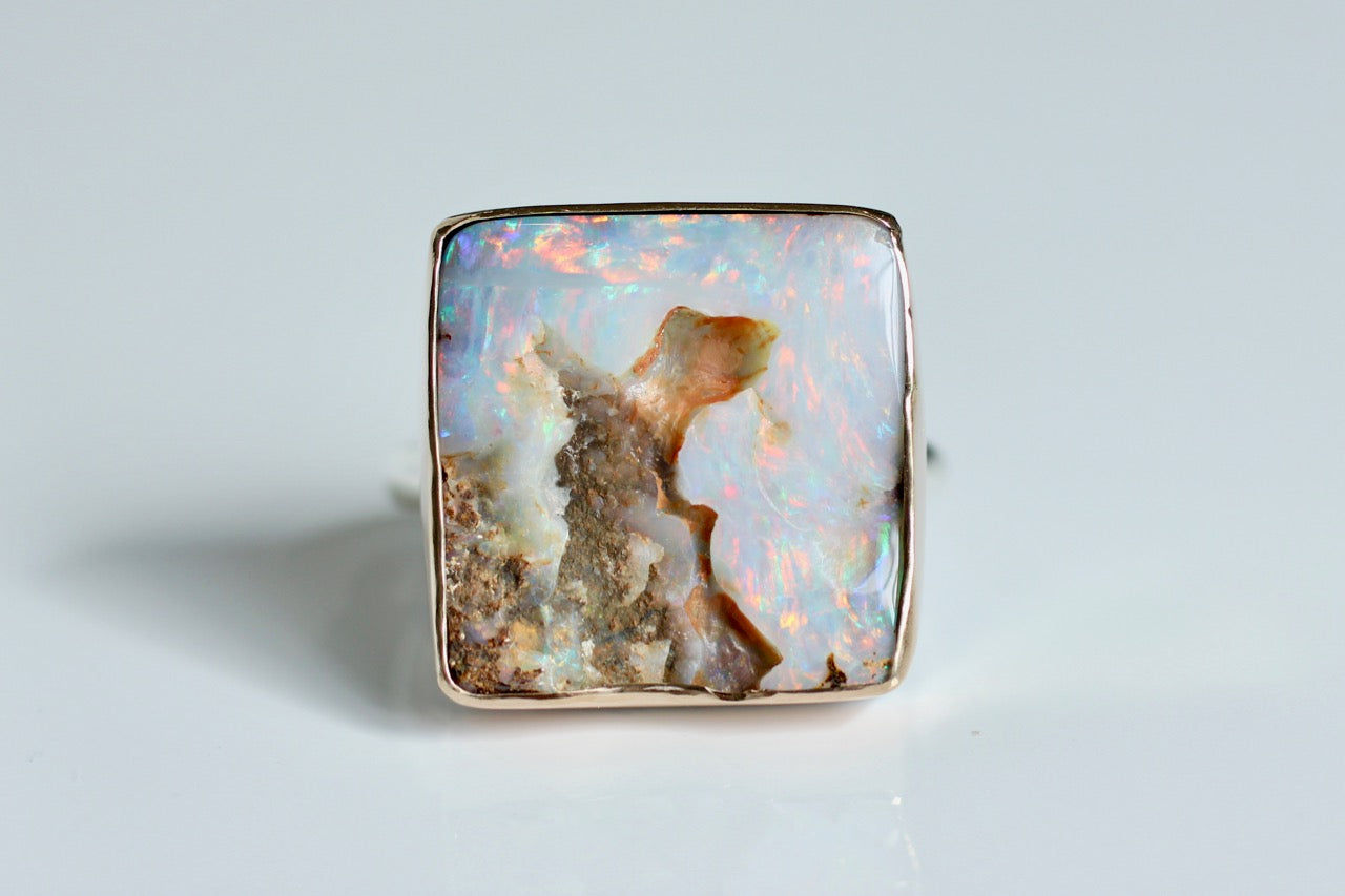 Rough Boulder Opal in yellow gold and sterling